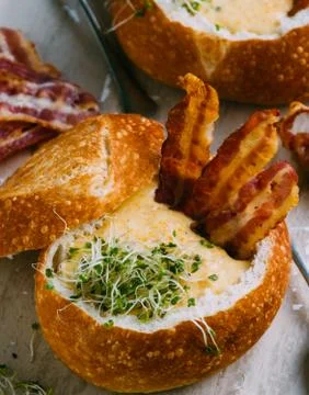 Soup in bread bowl Stock Photos