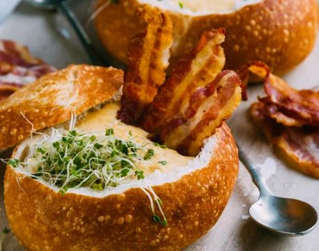 Soup in bread bowl Stock Photos