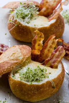 Soup in bread bowl Stock Photos