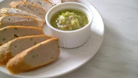 Soup with bread slices on a white plate Stock Photos