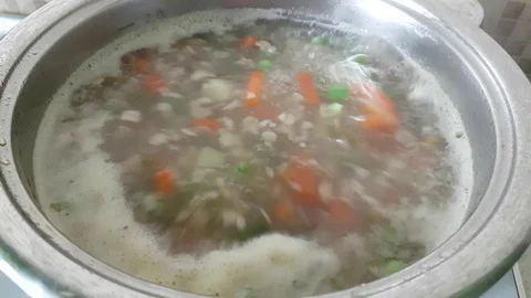 Soup is brewed in a saucepan Stock Footage 89245376