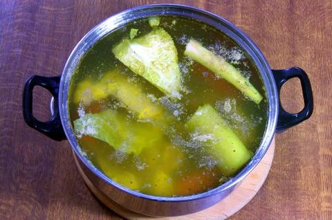 Soup broth Stock Photos