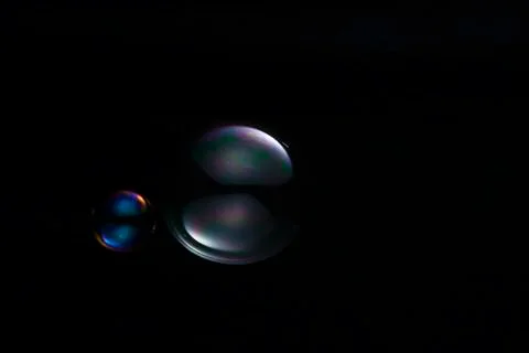 Soup bubbles isolated on black background Stock Photos