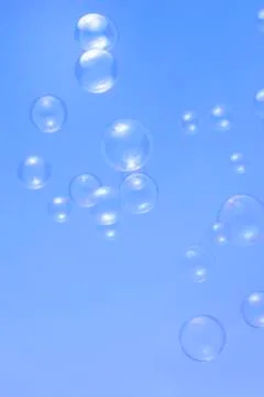 Soup bubbles isolated on blue background Stock Photos