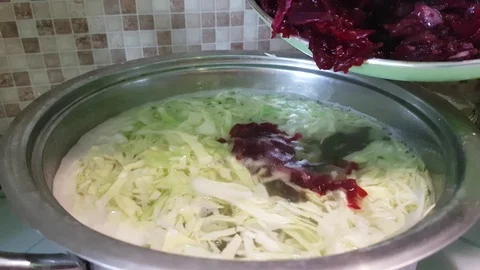 Soup with cabbage and beets in a saucepan Stock Footage 86307268