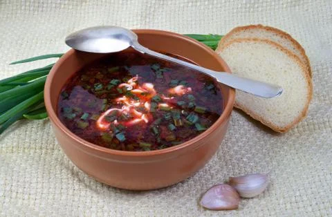 Soup in a clay dish Stock Photos