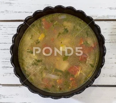 Soup closeup on white background stan alone Stock Photos