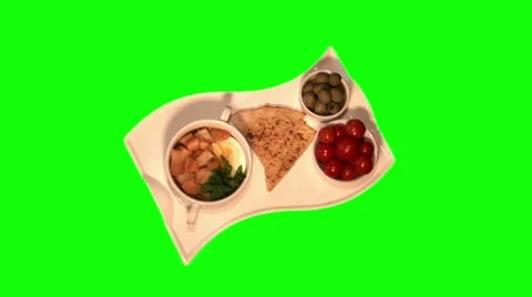 Soup with croutons, egg, marinated cherry tomatoes, olives, flat cake on tray Stock Footage 46563265