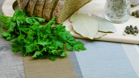 Soup decorated with fresh vegetables and bread. Stock Footage 82090438