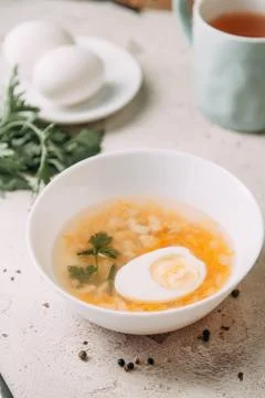 Soup with egg Stock Photos