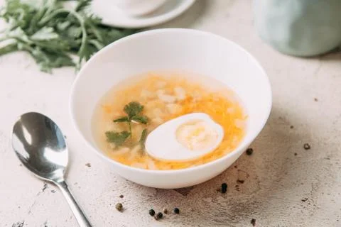 Soup with egg Stock Photos