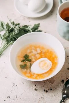 Soup with egg Stock Photos