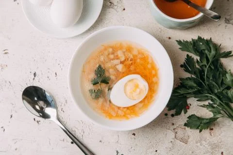 Soup with egg Stock Photos
