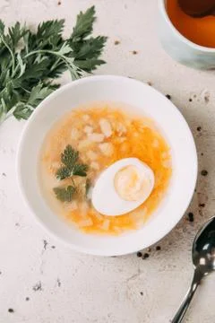 Soup with egg Stock Photos