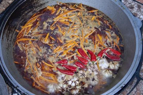 A soup with floating chilli 写真素材