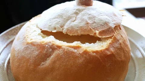 Soup inside of a round shape bread 動画素材 202273978