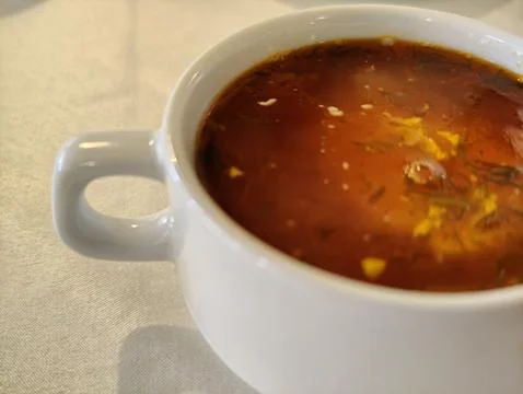 Soup for lunch on a light background Foto stock