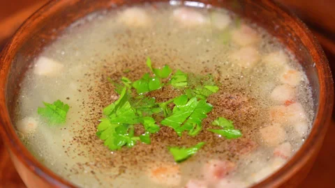 The soup with meat  in a plate. Stock Footage 254273449