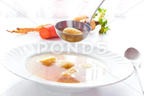 Soup with noodles Stock Photos