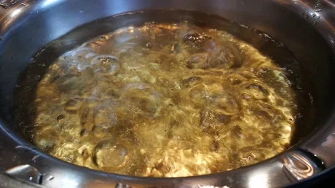 The soup in the pot is boiling in a restaurant. Stock Footage 96800863