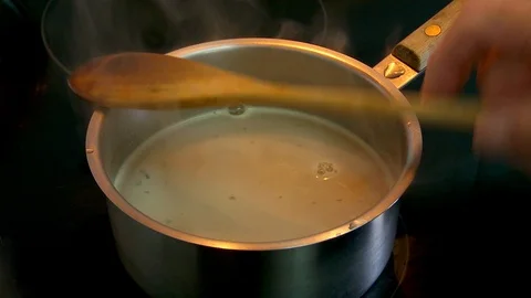 Soup prep  tasting Stock Footage 107321440