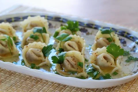 Soup from raviolis Stock Photos