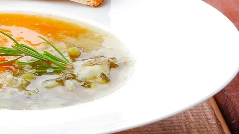 Soup served with toasts on white dish Vídeos de archivo 82076735