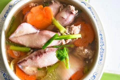 Soup, stuffed squid Foto stock