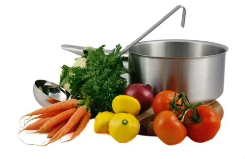 Soup Vegetables with cooking pan and ladle isolated on white background Stock Photos