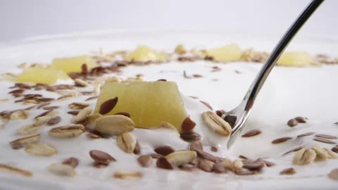 Sour cream with nuts, pineapples and seeds Video stock 141890138