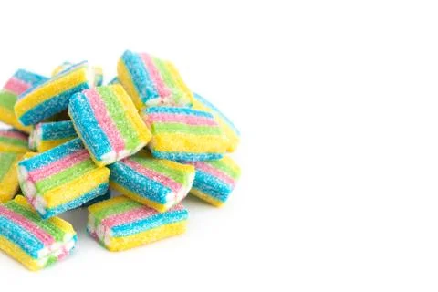 Sour Rainbow Colored Candy Filled with White Cream Stock-Fotos