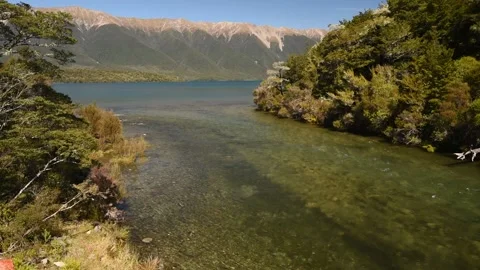 The source of the Buller River as it flows out of Lake Rotoiti, New Zealand. Stock Footage 148448307