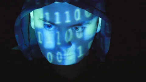 Source code projected over an angry hostile man's face, Stock Footage 64817720