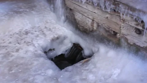 Source has a strong current and does not freeze in frost Stock Footage 87619262