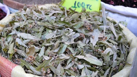 A source of healing in a large sack of linden leaves, 스톡 동영상 123873241