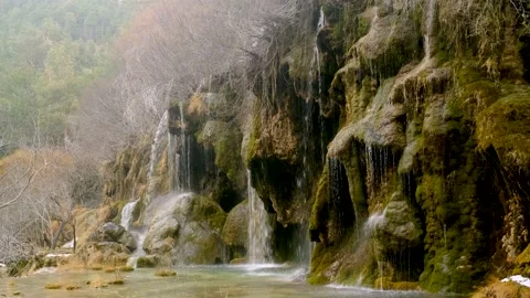 Source of river from filtered waters of the waterfalls falling from the cascade Stock Footage 178090996