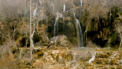 Source of river from filtered waters of the waterfalls falling from the cascade Stock Footage 178091043