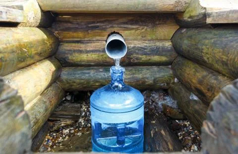 Source of spring water bottle Stock Photos