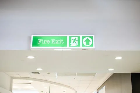 Source text.White background fire exit sign White lettering is clearly posi.. Stock Photos