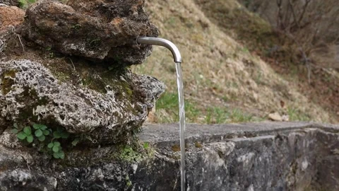 Source of water in the mountains. Environmental protection concept. Slow motion Stock Footage 245756507