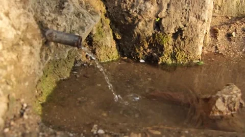 A source of water in the rock Stock Footage 49671751