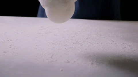 Sourdough being placed on surface with flour Stock Footage 132800224