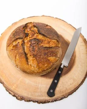 Sourdough bread with bread knife Stock Photos