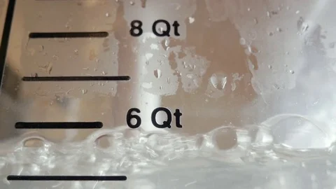 Sous-Vide Immersion Circulator Preheats Water in Plastic Tub Stock Footage 82035447