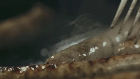 Sousages frying in the pan Stock Footage 76602485