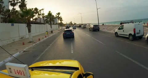 Sousse, Tunisia - Jan 10, 2025: Taxi car drive pov at Seaside boulevard stree Stock Footage 305163551