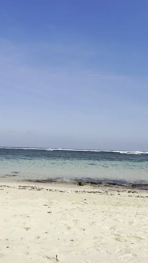 South Bali Beach Vertical Background with Gentle Waves and Copy Space Stock Footage 328528880