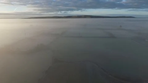 South Downs rising above low lying mist Stock Footage 86576716