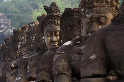The south gate of angkor thom, demons and angels bridge Stock Photos