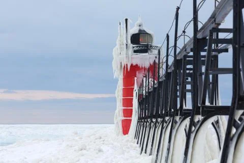 South Haven Pier Lighthouse Frozen in Ice Stock Photos